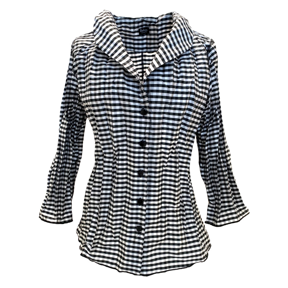 The blouse has a shawl collar and 3/4 sleeves. The pattern is a small black, white and grey check. the buttons are black.